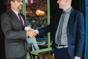 Shaking hands with a commercial real estate broker