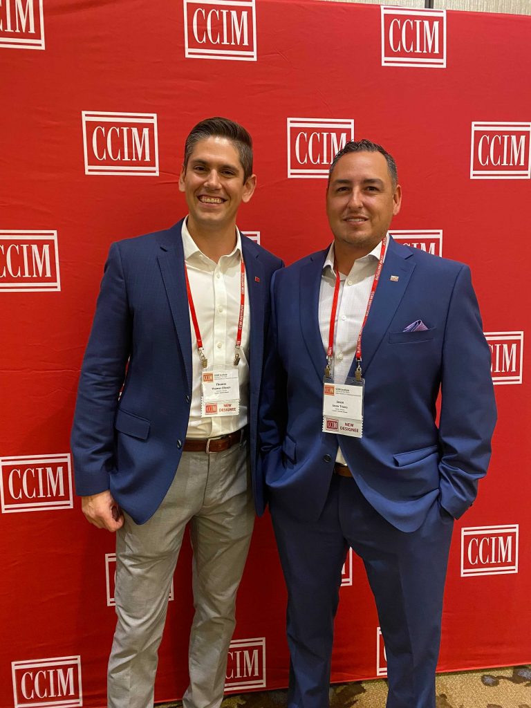 Tom Ellixson and Jason Triano after they earned the CCIM designation