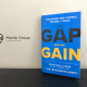 The Gap and the Gain book sits on a black table