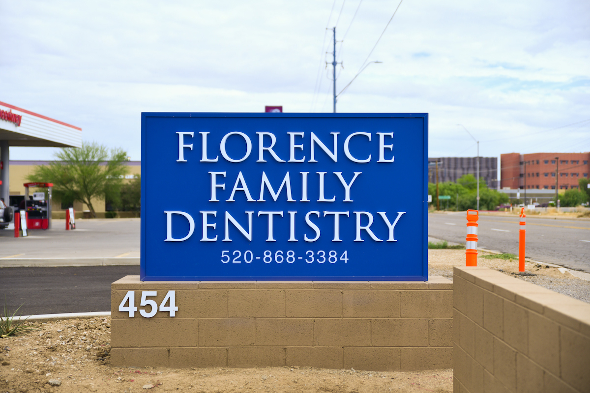 Blue sign that reads Florence Family Dentistry