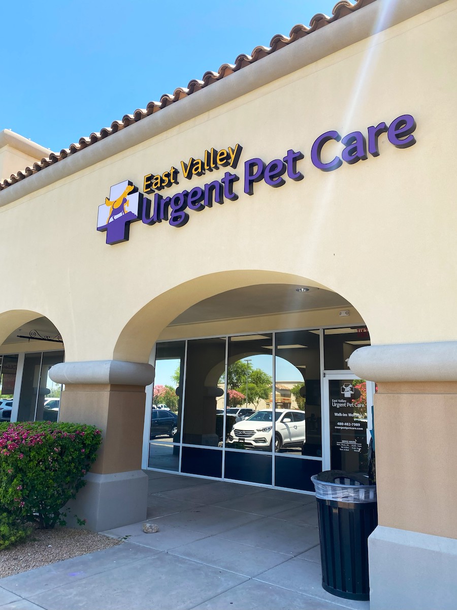 Exterior of tan building with sign that reads East Valley Urgent Pet Care