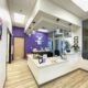 Reception desk with purple wall