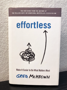 White book with title "Effortless" by Greg McKeown